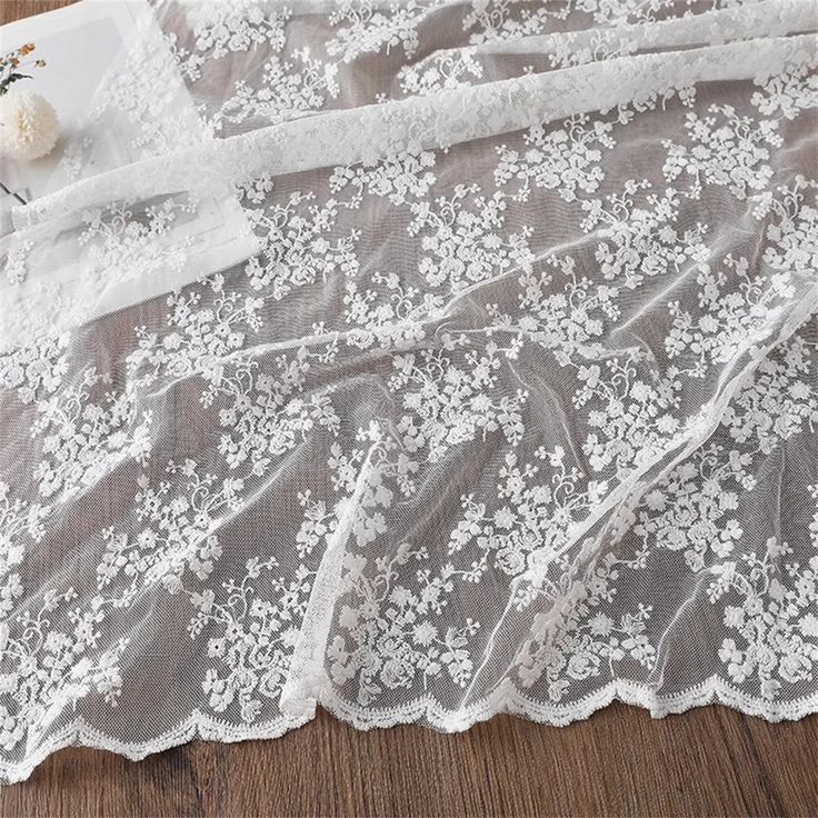 Cotton embroidery mesh lace fabric, small flowers embroidered lace fabric, perfect for DIY dress, costume, sewing projects, gown, veil. ☀Listing is for 1 yard. 1 yard is about 91 cm.  ☀Length: 1 yard  (additional  quantity is available.) ☀Width: About  51.1''( 130 cm) ☀Material: mesh+ cotton For delivery time, please contact me first. Or if you have any questions, please feel free to contact me. White Lace Embroidered Fabric, White Embroidered Lace Fabric, White Embroidered Net Fabric With Lace Work, White Tulle Fabric With Floral Embroidery, White Lace Tulle Fabric With Delicate Details, White Tulle Fabric With Lace Patchwork, White Lace Trim Tulle, White Lace With Floral Embroidery In Tulle, White Tulle Fabric With Lace Embroidery