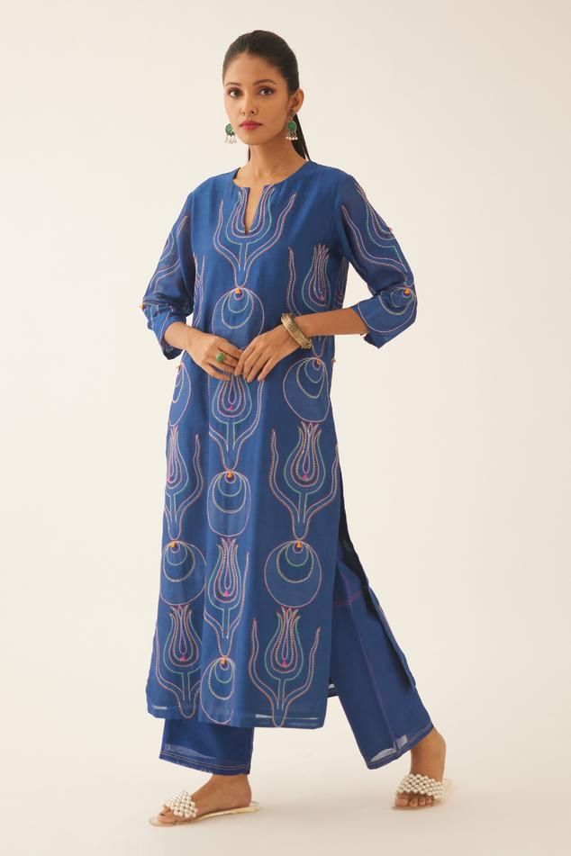 Blue silk chanderi straight kurta with all-over cotton applique work on the reverse side, highlighted with kantha work in the front with multi colored threads. Comes with blue silk chanderi straight pant with multi colored thread stitch detail and fuchsia stole with off white thread stitch on all four sides and silk thread tassels at corners.
Components: 3
Pattern: Embroidered
Type Of Work: Cotton Applique
Neckline: Notched
Sleeve Type: Three Quarter
Fabric: Kurta and Pant- Silk Chanderi, Stole- Blue Cotton Sets With Zari Work, Blue Cotton Kurta With Zari Work, Cotton Handloom Salwar Kameez With Straight Kurta, Blue Chikankari Embroidery Salwar Kameez, Blue Sets With Printed Motifs In Straight Kurta Style, Blue Mulmul Palazzo Set For Diwali, Cotton Silk Kurta With Block Print, Blue Mulmul Kurta With Zari Work, Blue Cotton Silk Salwar Kameez With Straight Kurta