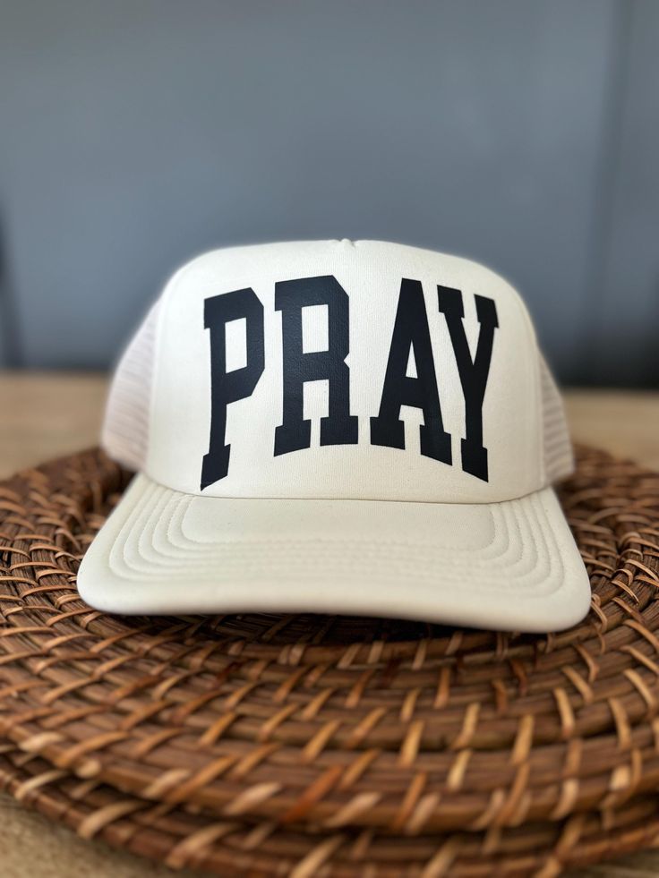 Trendy Hat, Christian Foam Trucker Hat, PRAY Trucker Hat, Foam Mesh Cap, Jesus Trucker Hat, Trucker Hat, Christian Gift, Religious Hat  Perfect hat for every Sunday and all the days in between. Change your energy and faith with our PRAY hat, available in Cream, Black and White, and Olive Green. Perfect for guys and gals that seek Prayer in all that they do. Cream Baseball Cap Trucker Hat For Outdoor, Vintage White Dad Cap, Vintage White Trucker Hat For Outdoor, White Vintage Fitted Hat With Curved Brim, Vintage White Flat Brim Hat, Vintage White Fitted Hat With Curved Brim, White Retro Sun Hat With Curved Brim, Retro White Sun Hat With Curved Brim, White Curved Brim Trucker Hat