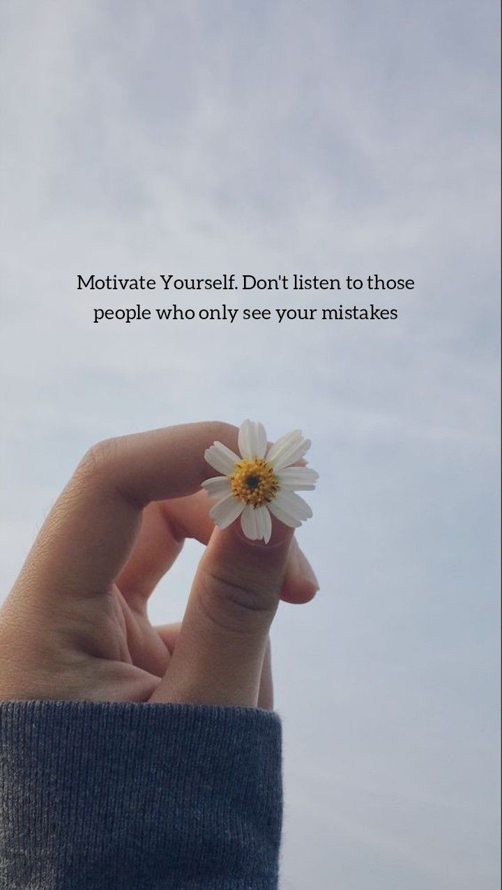 someone holding a flower in their hand with the quote motivve yourself don't listen to those people who only see your matches