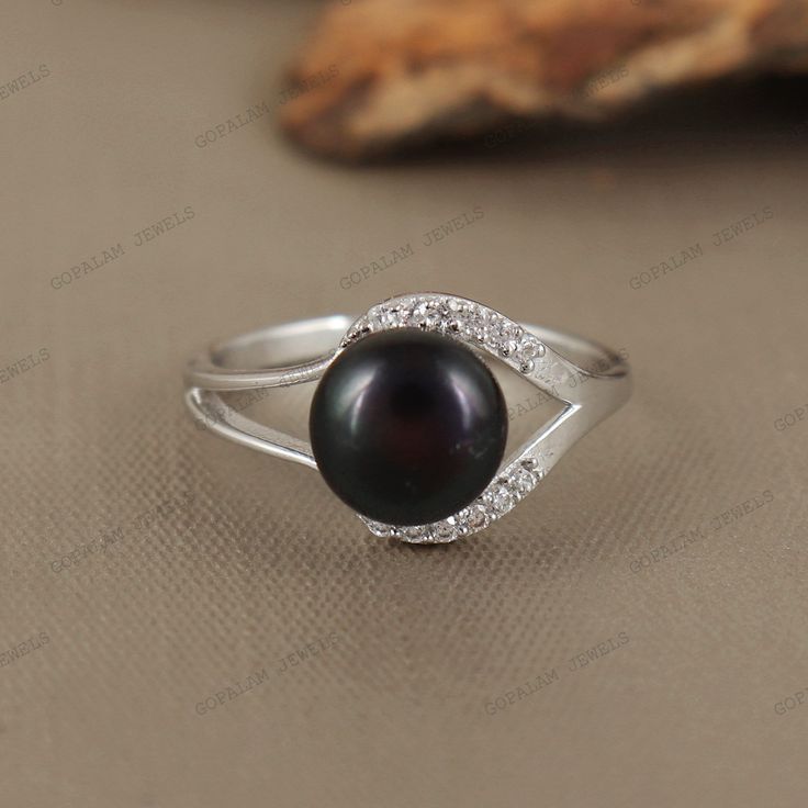 ★ PRODUCT DETAILS ★ * SKU:- RG-1104-B-PEARL * Product:- Ring * Metal:- Sterling Silver * Metal Purity:- 925 *  Ring Weight:- 2.95 Gms (Approx.) ★ STONE DETAILS ★ *  Stone Name:- Black Pearl *  Stone Shape:- Round *  Stone Size:- 8mm  *  Stone Weight:- 2.94 CTS (Approx.) *  Stone Color:- Black *  Stone Cut:- Smooth  *  Birthstone:- June ★ COLOR VARIATION:-  *  Images Are Enlarged To Show Finest Details Of The Stone. All Gemstones Are Natural And Some Color Difference And/or Variations In Natural Classic Black Pearl Ring, Classic Black Pearl Ring For Anniversary, Black Gemstone Rings For Jewelry Making, Fine Jewelry Black Round Pearl Ring, Fine Jewelry Black Pearl Ring, Black Pearl Ring Fine Jewelry, Black Pearl Ring In Fine Jewelry Style, Classic Black Pearl Ring For Wedding, Black Pearl Ring For Formal Occasions