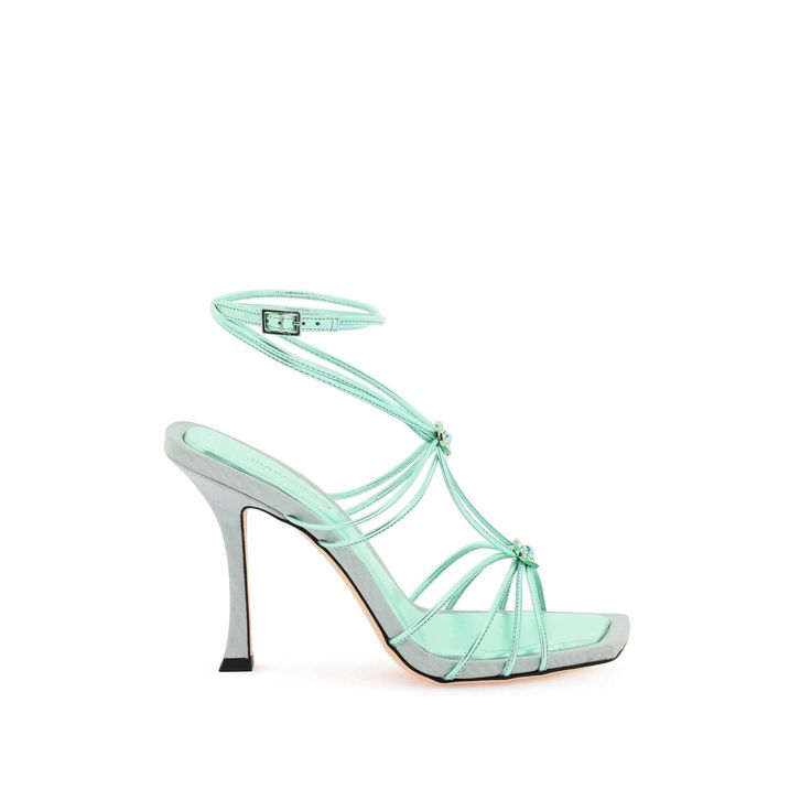 Indiya Sandals By Jimmy Choo Crafted In Metallic-Effect Nappa Leather And Characterized By Knotted Straps Embellished With Heart-Shaped Crystals. Buckled Ankle Strap, Added Leather Footbed And Leather Sole. Materal: 100%Leather 100%Tr. Made In: Italy. Color: Green. Collection: Fall - Winter 2023. Sku: Indiya 100 Avf. Heel Height: 100 Cm. Modecraze Is An Online Platform That Offers The Best Designer Products From Europe To Customers All Over The World. Our Exclusive Partnerships With European Ret Evening Sandals With Single Toe Strap In Green, Evening Green Sandals With Single Toe Strap, Green Open Heel Sandals For Cocktail, Green Open Heel Sandals For Cocktail Events, Green Ankle Strap Sandals For Cocktail, Green Sandals With Removable Insole For Party, Elegant Green Strappy Sandals, Designer Heels With Strap For Summer, Designer Strap Heels For Summer