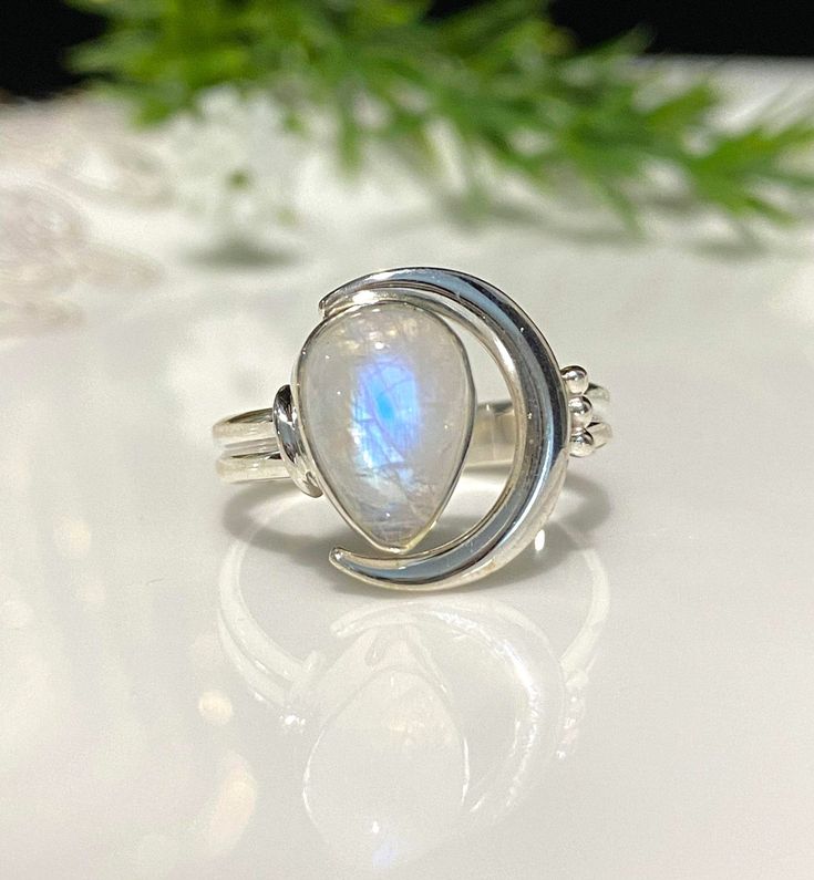 Vintage Sterling Silver Natural Moonstone Moon Ring ....Marked 925...Total of weights 3.2grams...Size 7...Measure of Face 14MMIt's in very good condition. Silver Celestial Moonstone Ring, Silver Moonstone Ring With Moon Phase, Silver Moon-shaped Celestial Moonstone Ring, Celestial Silver Moonstone Ring, Sterling Silver Round Moonstone Ring With Moon Phase, Silver Oval Ring With Moon Phase, Celestial Moon-shaped Moonstone Ring In Sterling Silver, Silver Oval Rings With Moon Phase, Silver Oval Moon Phase Ring