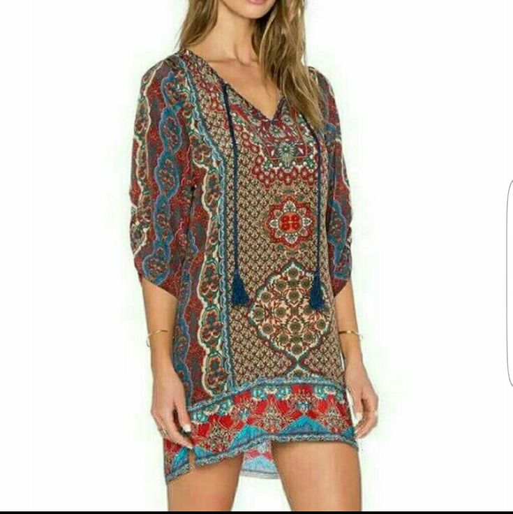 Price Firm Time To Get 'Festival' Ready With This Awesome Hippie Boho Chic Ethnic Mini Dress With 3/4 Sleeves And Tassel At Neckline. Measured Laying Flat Small Bust 18.5" Length 32" Large Bust 20.5" Length 32" 87% Cotton, 13% Acetate Has A Satiny Feel. No Stretch. Patterned Bohemian Dress, Multicolor Bohemian Boho Dress With Paisley Print, Multicolor Boho Print Folk Dress, Multicolor Bohemian Dress With Paisley Print, Multicolor Folk Boho Dress With Boho Print, Folk Style Multicolor Boho Print Dress, Multicolor Folk Style Boho Dress, Bohemian Mini Dress With Vibrant Print, Bohemian V-neck Tunic With Floral Print