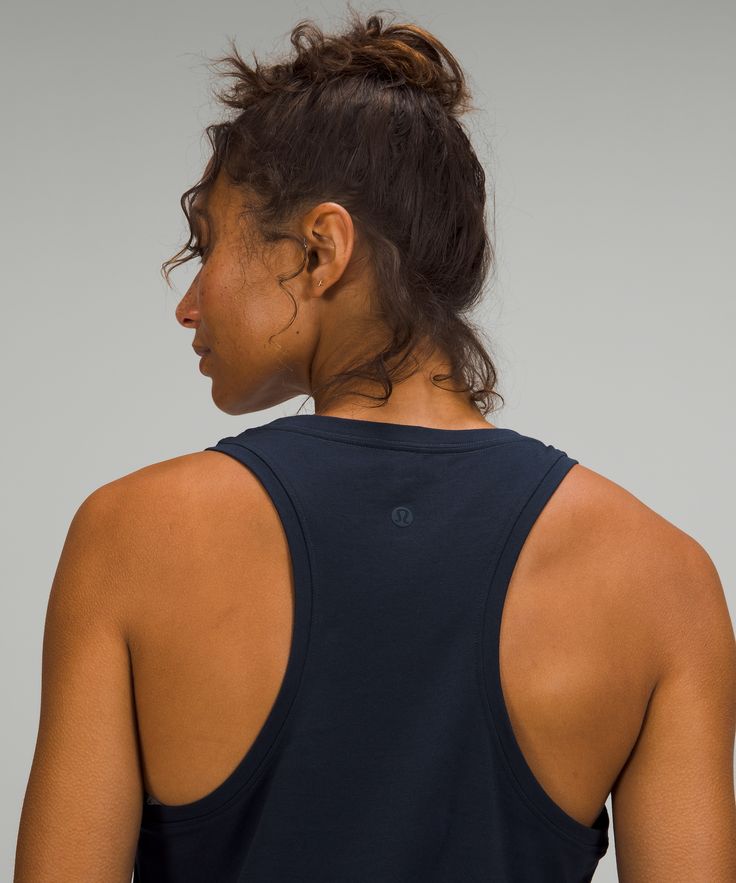 Lots of reasons to love this tank top. Soft cotton fabric, just the right stretch, and a casual fit for every day of the week. Pima Cotton Fabric, Lululemon Women, Back Women, Day Of The Week, Tank Top Designs, Casual Fit, Sleeveless Tank Top, Leggings Shop, Sleeveless Tank