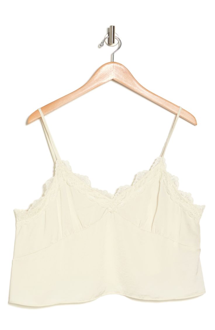 Showcase your sultry style in this flattering cropped camisole trimmed with lovely lace. 20" length (size 1X) V-neck Spaghetti straps 100% polyester Hand wash, line dry Imported V-neck Tank Top With Lace Trim For Daywear, V-neck Lace Crop Top With Lace Trim, Chic Cropped Lace Trim Tank Top, Chic Spaghetti Strap Crop Top With Lace Trim, Lace V-neck Crop Top With Lace Trim, Spring Lace V-neck Camisole, Cropped Lace Tank Top With Lace Trim, Cami Crop Top With Lace Trim, Spring V-neck Camisole With Lace Trim