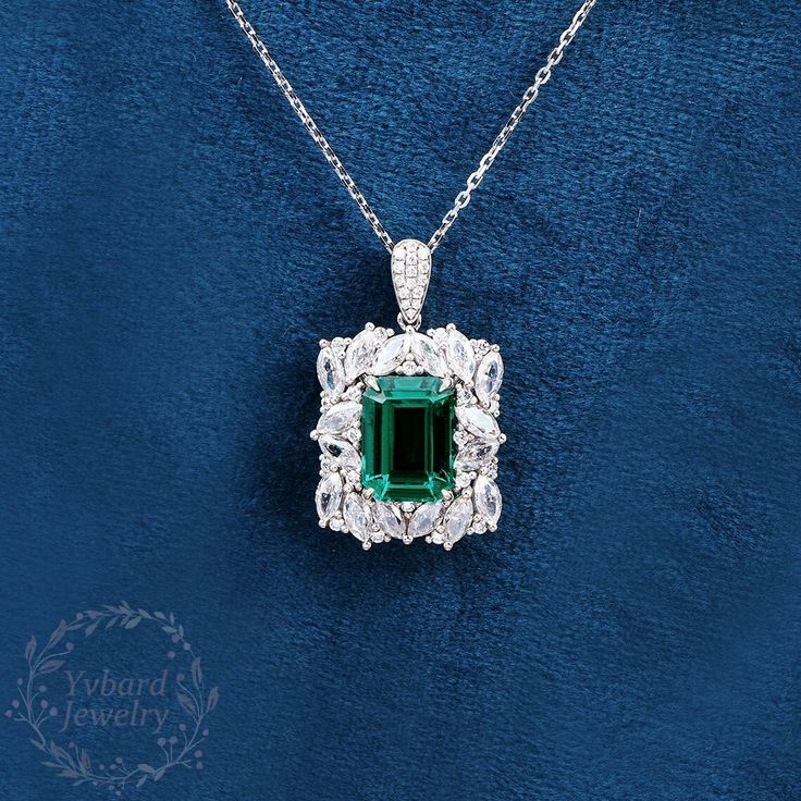 "Jewelry Details -Gold Type: Solid 10K Gold / Solid 14K Gold (Choose One in Material Option) -Center Stone: Lab Created Emerald 8*11mm, Approximately 3.68ct Color: Green--- 5A Clarity: VVS Cut: Emerald Cut / 3EX -Side Stone: 13.38cttw moissanite Color: DF Clarity: VVS1 Cut: Round Cut, Marquise Cut -Pendant Width: 17mm -Pendant Height: 28mm -Chain Length: 40+3+3cm SKU: YP0039 ~*-*~Purchase Guarantee: - All our jewelry is handmade, and each process is refined. - 14 Day Refund Guarantee. - All our Exquisite Emerald Pendant Necklace For Weddings, Fine Jewelry Emerald Bridal Necklace For Anniversary, Luxury Emerald Cut Emerald Necklace For Wedding, Luxury Emerald Cut Necklace For Wedding, Elegant Emerald Pendant Necklace For Wedding, Elegant Wedding Emerald Pendant Necklace, Emerald Necklace With Brilliant Cut For Wedding, Emerald Necklace With Diamond Cut For Wedding, Exquisite Emerald Necklace With Diamond Cut For Wedding