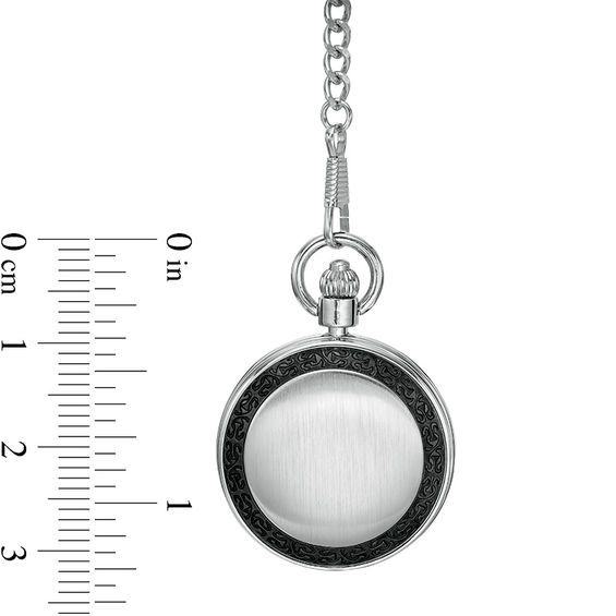 Appeal to his timeless style with this pocket watch from James Michael. Crafted in a satin-finished silver-toned alloy, this watch features a 47.0mm case, black dial, gunmetal textured bezel, and silver-toned numbers. A traditional hand-wind movement complements the look. The 13.0-inch figaro chain secures with a spring-ring clasp. This pocket watch includes a one-year limited manufacturer's warranty. Classic Formal Watch Accessory With Stopwatch, Timeless Chronograph Pocket Watch With Round Dial, Timeless Formal Watches With Stopwatch, Formal Metal Pocket Watch, Timeless Watches With Stopwatch As Gift, Timeless Watches With Stopwatch For Gift, Silver Stainless Steel Engraved Watch, Engraved Silver Stainless Steel Watch, Timeless Gift Watches With Stopwatch