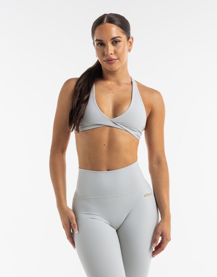 The Freedom Sportsbra combines everything you need in the support of a sports bra into a crop top design. The Freedom Sportsbra is incredibly soft, breathable and perfected in both fit and design - Double lined with no padding - Support is light to moderate - Supportive straps with a crossback design - Fabric is incredibly soft and breathable 80% Polyester, 20% Spandex Bella is wearing a Small, is 5'4" Cropped Yoga Sports Bra With Built-in Bra, High Stretch Crop Top With Built-in Padding For Workout, Sporty High Stretch Crop Top With Built-in Padding, Cropped Sports Bra With Built-in Bra For Training, Sports Crop Top With Built-in Bra And 4-way Stretch, Athleisure Crop Top With Built-in Bra For Light Sports, Compressive Crop Top With Built-in Padding For Workout, Gray Activewear With Built-in Bra For Sports, Compressive Crop Top Sports Bra For Yoga