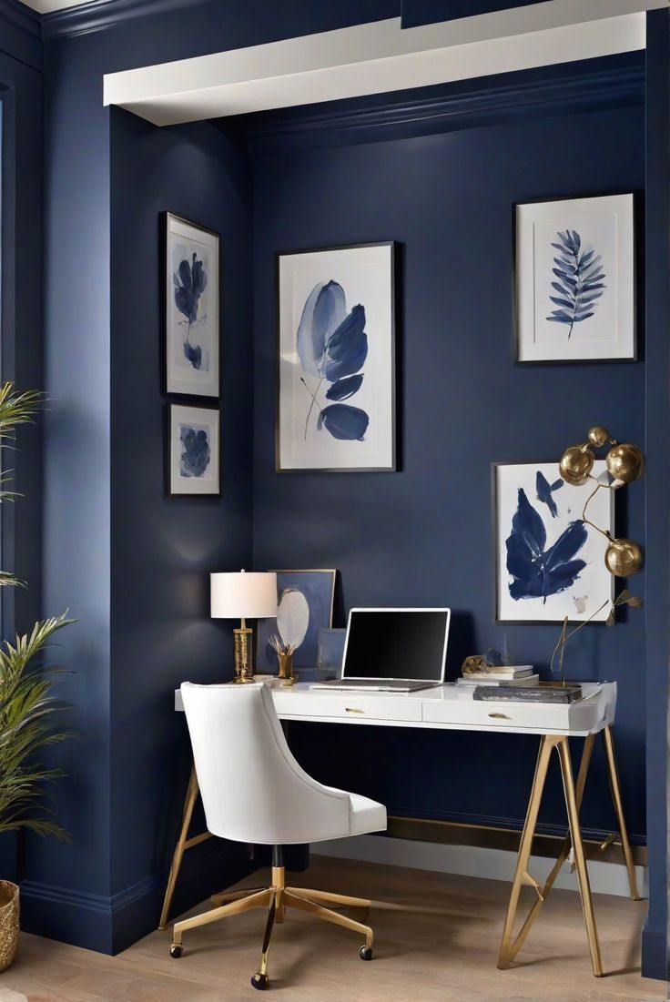 a home office with blue walls and gold accents