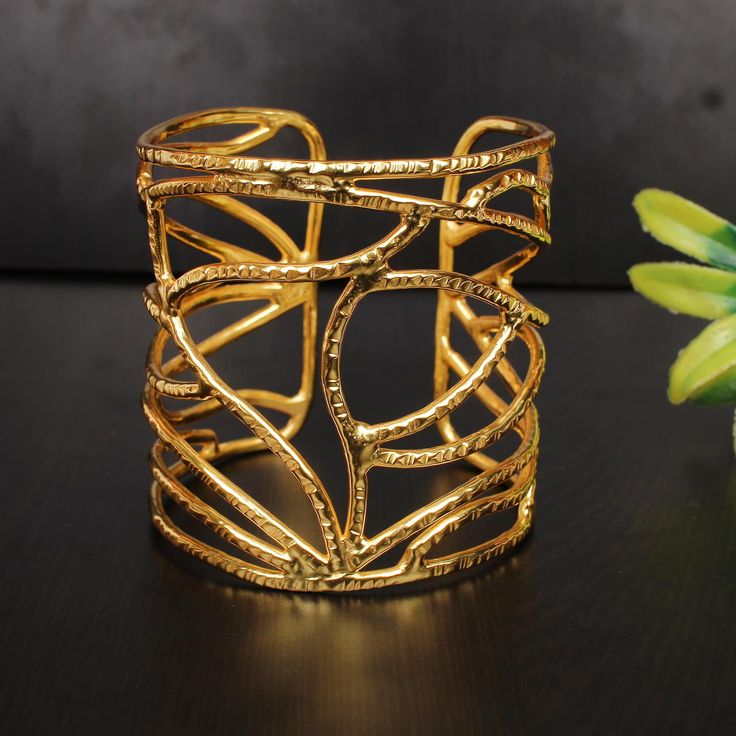 Traditional Cuff Bangle, Women Adjustable Bangle, Handmade Bangle, Designer Bangle, Gold Plated Bangle, Partywear Bangle, Hammered Jewelry Description : ✦Material : Brass ✦Weight : 59.87 Gram Approx ❣❣ Handmade Item ❣❣ **Made to Order** » C U S T O M I Z E O R D E R « All gemstone jewelry is made with silver and brass. If you want to make any changes with this jewelry, then please send us a message. We will make as per your requirements. For more beautiful designs please visit our Etsy shop belo Adjustable Metal Bangle For Party, Gold Bohemian Cuff Bracelet For Formal Occasions, Handmade Metal Bracelets For Party, Bohemian Metal Bangle For Party, Bohemian Gold Cuff Bracelet For Formal Occasions, Bohemian Cuff Bracelets For Party, Unique Adjustable Bangle For Party, Handmade Party Bangle Bracelet, Handmade Gold Cuff Bracelet For Party