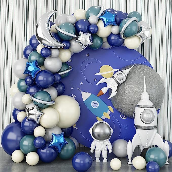 an astronaut balloon arch with blue, white and silver balloons