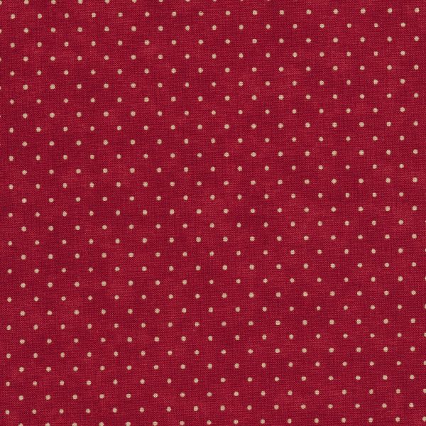 a red background with white polka dots