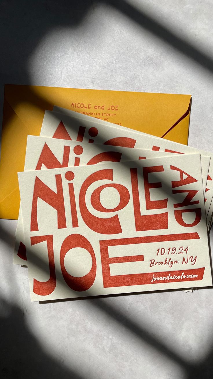 two pieces of paper with the words nice joe on them sitting next to each other