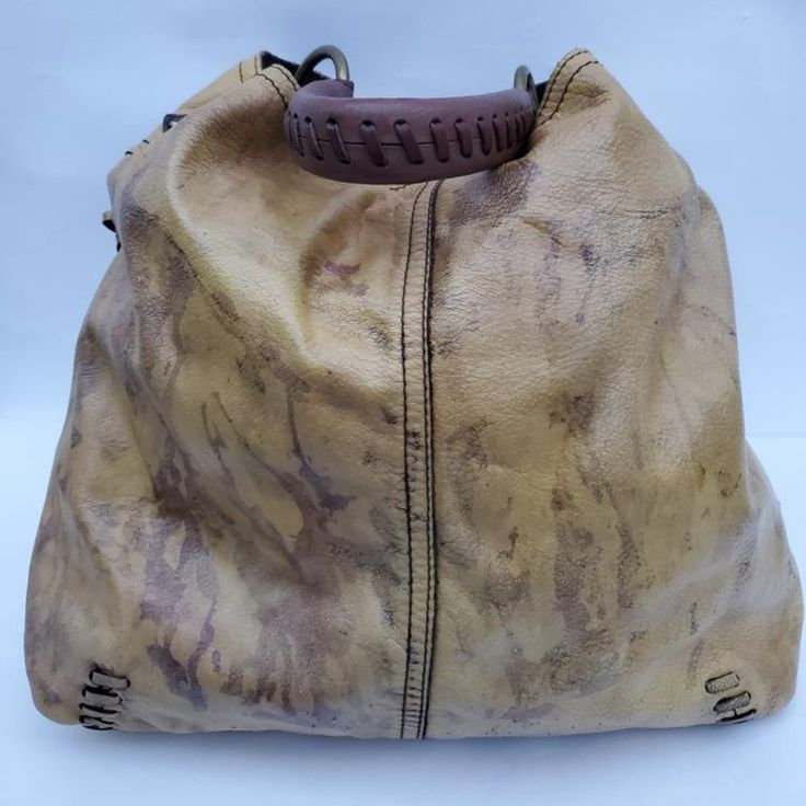 Lucky Leather Hobo Handbag Tote Bucket Bag Dyed Yellow Ochre, Brown, Beige Tan, Black & Tan Gray Grey Size: Approximate- H: 15" W: 17 Hand Painted. Only One Like It In The World!!! Very Boho Chic ..And One Of A Kind! And Great Quality And Condition. Hand Painted Clothing And Other Bags Available In Other Colors And Styles In My Store Occasion: Business, Casual, Travel, Workwear Theme: Boho, Art, Bohemian, Classic, Colorful, Cowboy, Cowgirl Equestrian Rustic Designer, Fun, Hippie, Western, Southwestern, Modern Designer, Tie Dye Southwestern Modern, Painted Clothing, Hand Painted Clothing, Leather Hobo Handbags, Boho Cowgirl, Western Rodeo, Hobo Handbag, Yellow Ochre, Cowgirl Western