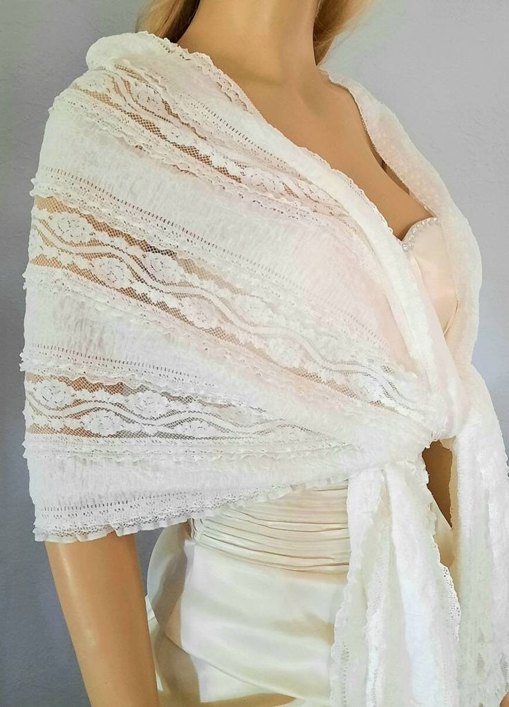 "-Ivory Lace Wedding Shawl, Bridal Wrap, Bridal Wedding Scarf, Lace Bridesmaid Shawl,Evening shawl and wrap,Party Dress Cover up-SF007 -- Many color lace shawl is perfect for brides and bridesmaids. this shawl is elegant and light weight cover up . Color: Ivory, White, Grey Made in U.S.A. and Handmade Please handwash only. **Measurement** Approximately 72\"Long x 16-18 \" wide" Elegant Fitted Lace Shawl, Fitted Elegant Shawl With Lace Trim, Elegant Fitted Shawl With Lace Trim, Elegant Lace Shawl Scarf, Fitted Shawl For Mother Of The Bride, Elegant Cream Lace Shawl, Fitted Wedding Shawl Wrap, White Shawl Wrap For Wedding, Elegant Fitted White Shawl