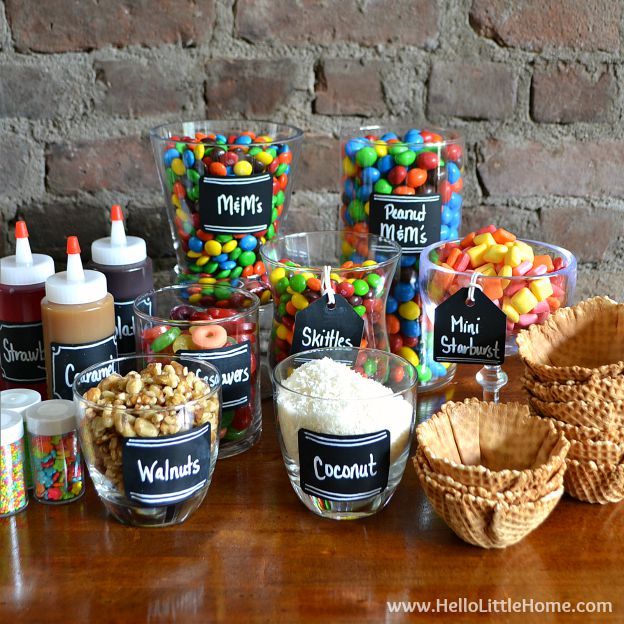 there are many different types of candies in bowls on the table with each other