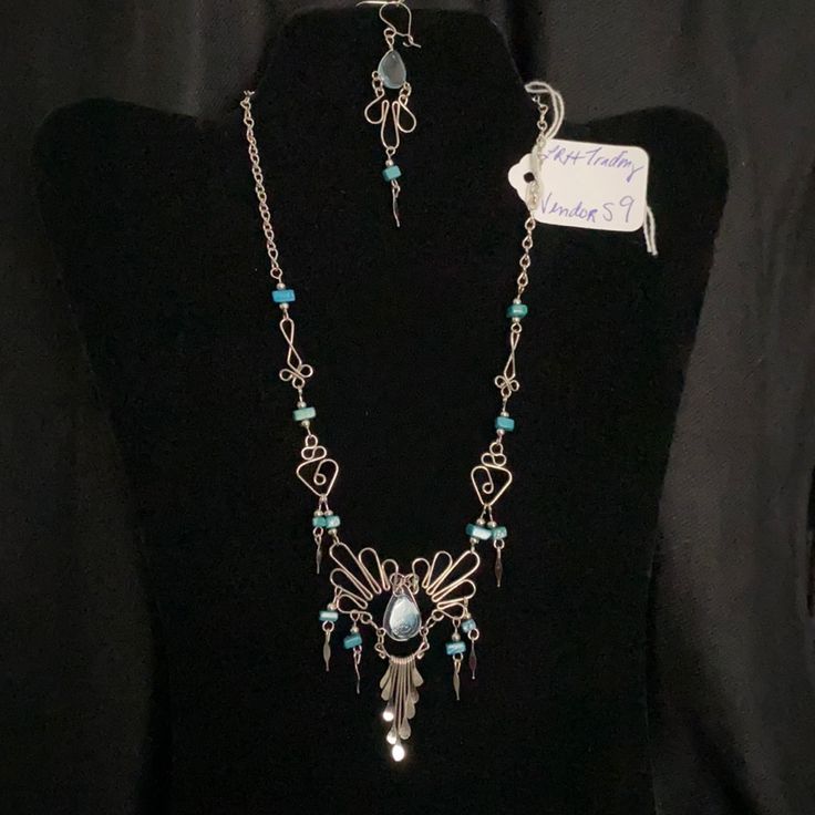 Handmade In South America. New Never Worn. Very Detailed And Intricate Necklace And Earring Set. The Material Is Alpaca Silver Which Is A Non-Rust Non-Tarnish Alloy. The Earrings Are Feather Light And Will Not Weigh Down Your Ear Lobes. The Necklace Is Roughly 17 1/2 Inches Long And The Earrings Are Roughly 3 Inches Long. Glass And Turquoise Chip Details From A Smoke Free Home. Blue Metal Jewelry Sets As A Gift, Silver Wire Wrapped Costume Jewelry, Blue Costume Jewelry In Sterling Silver, Blue Metal Jewelry Sets, Blue Sterling Silver Costume Jewelry, Blue Sterling Silver Necklace With Matching Earrings, Blue Wire Wrapped Dangle Jewelry, Handmade Blue Dangle Jewelry Sets, Blue Pendant Necklace With Matching Earrings