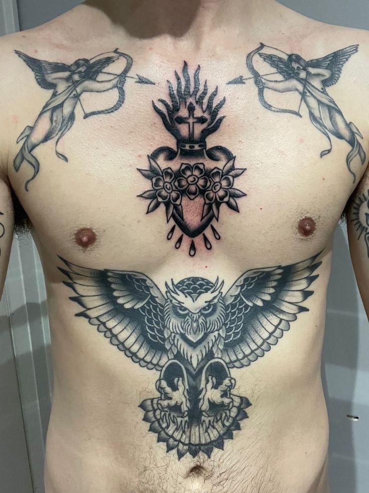 Sacred heart tattoo Traditional Chest Piece Tattoo Men, Tradition Chest Tattoo, Owl Stomach Tattoos Men, Sacred Heart Tattoo On Chest, Sacred Heart Chest Tattoo Men, American Tradition Chest Tattoo, Elbow Scar Tattoo Cover Up, Traditional Tattoos Chest Piece, Sacred Heart Chest Tattoo Female