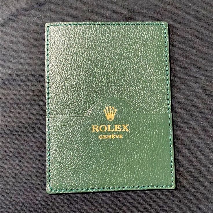 Green Leather Rolex Genve Card Holder Wallet With Signature Gold Crown Logo At Front - Rolex Card Holder - Green Leather - Unlined With Card Slots Measurements: (Approximate) Width: 3.5" Height: 4.75" Color: Green Condition: Nwot Formal Green Wallet With Rfid Blocking, Green Rectangular Business Wallet, Green Bifold Wallet For Formal Occasions, Classic Green Bifold Wallet, Luxury Green Wallets With Rfid Blocking, Luxury Green Wallet With Rfid Blocking, Green Leather Card Holder For Formal Use, Green Wallet With Card Slots For Formal Occasions, Classic Green Wallets As Gift