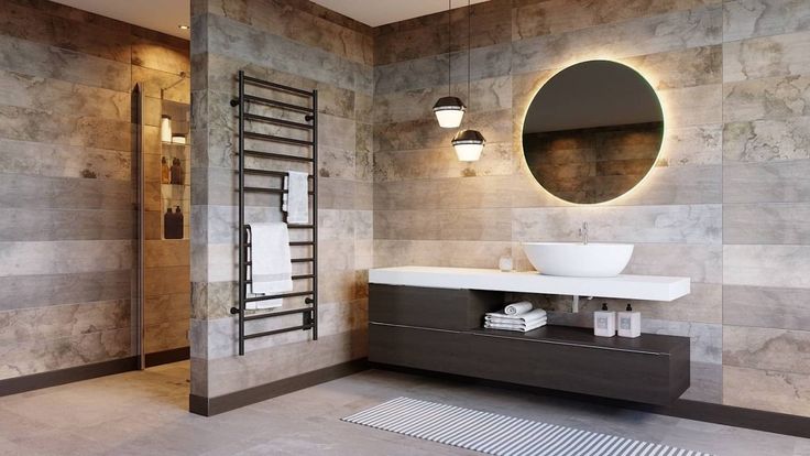 a bathroom with a sink, mirror and towel rack on the wall in front of it