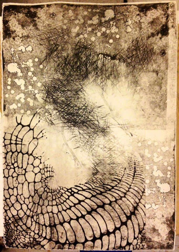 an abstract drawing on paper with black and white ink