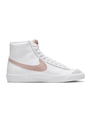 Styled for the ‘70s. Loved in the ‘80s. Classic in the ‘90s. Ready for the future. The Nike Blazer Mid ’77 delivers a timeless design that’s easy to wear. Its unbelievably crisp leather upper breaks in beautifully and pairs with bold retro branding and luscious suede accents for a premium feel. Exposed foam on the tongue and a special midsole finish make it look like you’ve just pulled them from the history books. Go ahead, perfect your outfit. Shown: White/Peach/Summit White/Pink Oxford Style: CZ1055-118 Cool Shoes For Girls, Nike Blazer Mid 77 Women, Custom Nike Blazers, Blazer Mid 77 Vintage, Nike Blazers, High Tops Women, Nike Kicks, Preppy Shoes, Nike Blazer Mid 77