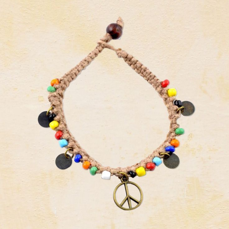 Peace Sign Beaded Hemp Bracelet Colorful and festive, our Peace Sign Beaded Hemp Bracelet features a cobra braid, multi-colored beads, four coins and a peace sign at its center. Find it @ Hippie Shop! #HippieShop #Peace #Hemp #Sustainable #Boho #Hippie Tie Dye Tapestry, Hippie Shop, Hemp Bracelet, Blue Acrylic Nails, Hemp Bracelets, A Bracelet, Scrunchie Hairstyles, Peace Sign, Boho Hippie