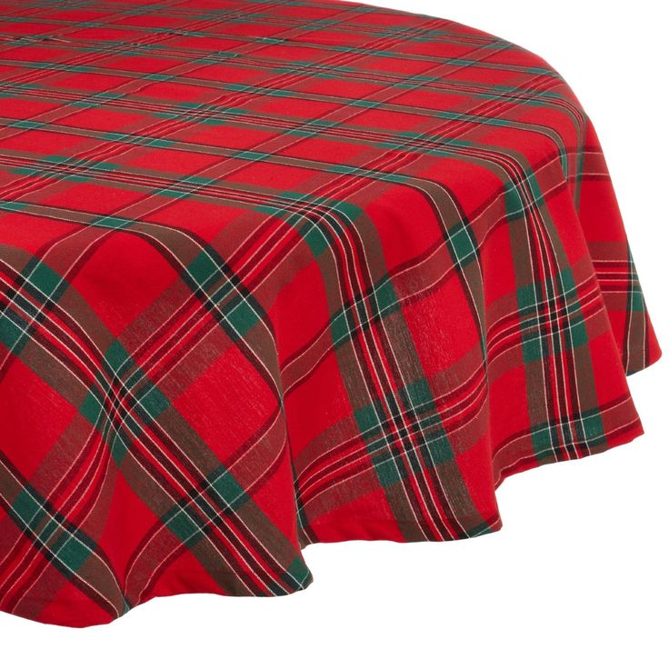 a red and green plaid tablecloth on a white background