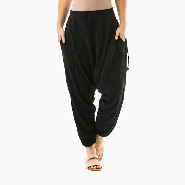 Black Savanna Buddha Pants Harem Pants Size Xs Washed Once Never Worn Light Weight And Super Comfortable Chic Black Harem Pants For Loungewear, Chic Black High-waisted Harem Pants, Black High-waisted Parachute Pants For Summer, Chic Black Parachute Pants For Summer, Black Harem Pants With Elastic Waistband For Spring, Black Tapered Leg Bottoms For Summer, Black Harem Pants With Elastic Waistband And Tapered Leg, Black Tapered Leg Summer Bottoms, Chic Black Harem Pants With Relaxed Fit