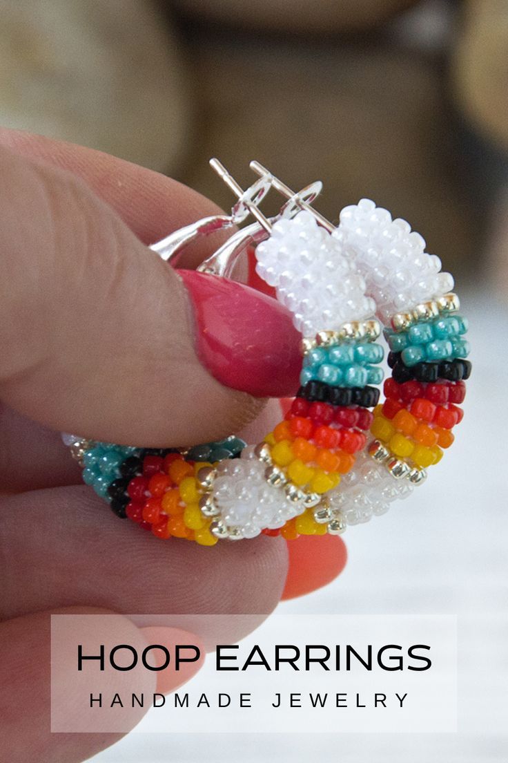 White beaded hoop earrings Handmade Bohemian Hoop Beaded Bracelets, Handmade White Hoop Earrings For Festivals, Southwestern Beaded Hoop Earrings, Handmade Heishi Beads Earrings, Bohemian Heishi Beads Hoop Earrings As Gift, Festival Colorful Beaded White Hoop Earrings, Handmade Multicolor Hoop Earrings With Heishi Beads, Festival White Hoop Earrings With Colorful Beads, Handmade Multicolor Heishi Beads Hoop Earrings