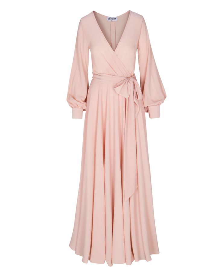 This 70's inspired maxi dress features a sexy cross front V-shaped surplice neckline. The elasticized waist adjusts to fit a range of sizes and has an attached self-tying belt at the right-hand side seam. The cuffed bell sleeves add a hint of retro glamour. The opaque fabric has a butter-soft hand with gorgeous, vibrant hues. The full, sweeping circle mid-length skirt is perfect for making a dramatic entrance to any event. The skirt is partially lined. ** Based on the settings of your display, c Circle Maxi Skirt, Dramatic Entrance, Retro Glamour, La Colors, Fashion District, Surplice Neckline, Medium Dress, Mid Length Skirts, 70s Inspired