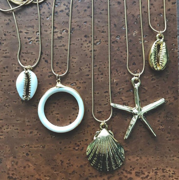 We love this fun and summery, beachy necklace. Answer the siren's song and get one for yourself or someone you love. Would make a great gift for the surfer or beach-lover in your life! A 14k gold plated scallop shell dangles from a lustrous, high quality gold filled snake chain. The perfect summertime accessory! Chain length 16" with an additional 2" extender for a possible length of 18".✦ JEWELRY CARE ✦✧ Warm water and a soft cloth are the best thing you can do to maintain the beauty of your je Cheap Beach Clavicle Chain Necklace, Cheap Chic Beach Jewelry, Cheap Novelty Beach Jewelry, Water Jewelry, Cowrie Shell Jewelry, Beachy Necklace, Cowrie Shell Necklace, Turquoise Stud Earrings, Star Pendant Necklace