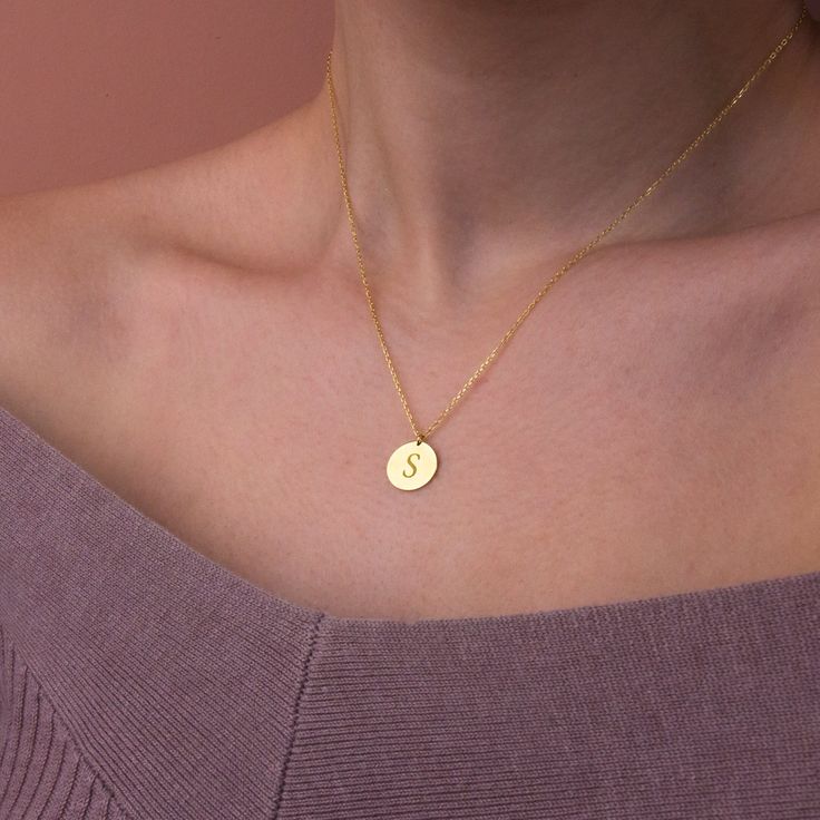 This stylish and minimalist 14K gold initial necklace is a great choice for both casual everyday outfits and for special occasions. Simple yet design of this dainty gold initial necklace allows you to dress up or dress down depending on the situation. Show your love to the special people in your life with this dainty gold initial necklace. It makes a perfect custom birthday gift for mothers, friends, or even yourself. Add the initials of your family members for a personalized gift for mothers an Dainty Everyday Initial Necklace With Round Pendant, Minimalist Yellow Gold Initial Necklace For Personalized Gift, Minimalist Initial Pendant Charm Necklace With Birth Flower, Simple Gold Initial Necklace For Everyday, Everyday Initial Necklace For Mother's Day, Minimalist Birth Flower Charm Necklace With Initial Pendant, Minimalist Birth Flower Initial Pendant Charm Necklace, Everyday Minimalist Initial Pendant Necklace, Minimalist Birth Flower Initial Pendant Necklace