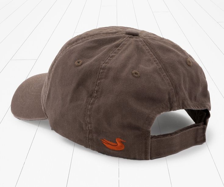 Known for their migration to southern lands, geese fly south to warmer climates to escape the harsh winter weather. We set out to capture this essence while creating this comfortable hat. Made from soft cotton with a velcro back, this will surely be one of your new favorites. 100% Cotton Custom Flying Geese Design Velcro Back Embroidered Duck on Back Brown Cotton Baseball Cap For Outdoor Activities, Casual Hiking Hat With Short Brim, Casual Short Brim Hat For Hiking, Brown Cotton Beanie Hat, Cotton Winter Hat For Outdoor Activities, Outdoor Cotton Hat One Size, Adjustable Cotton Outdoor Hat, Brown Cotton Hats One Size Fits Most, Cotton 5-panel Winter Hats