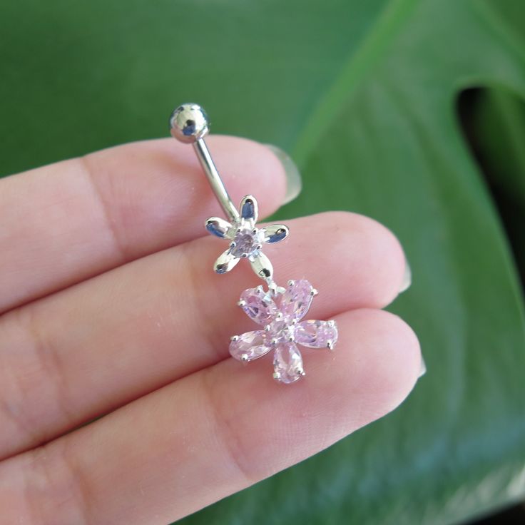 Hawaiian Sterling 925K Silver Plated Pink Clear Flowers CZ Gem Scrolling Belly Ring All belly ring comes with a gift box. Flower Shaped Cubic Zirconia Gift Ring, Dazzling Cubic Zirconia Flower Ring Gift, Gift Flower Ring In Cubic Zirconia, Fine Jewelry Style, White Gold Cubic Zirconia Flower Ring As Gift, Elegant Cubic Zirconia Belly Rings As Gift, Gift Cubic Zirconia Flower Ring With Prong Setting, Diamond White Cubic Zirconia Flower Ring Gift, Gift Flower Ring In Diamond White Cubic Zirconia, Dazzling Flower Shaped Rings For Gifts