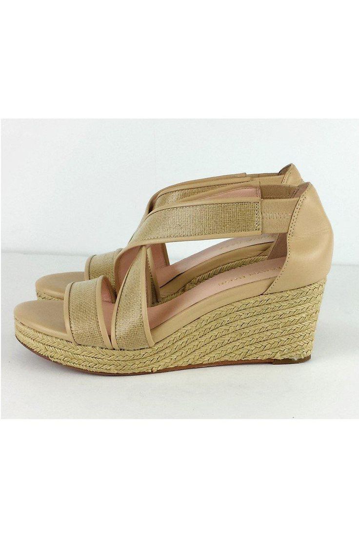 Step into these strappy wedges with braided rope details. These espadrille sandals are your new warm weather go-to shoe. Size 7.5M Slip on Elastic at ankle Leather lining Rope wrapped heel & platform Cross straps Outsole wear Discoloration on left side heel Platform height 1.5" Heel height 3" Taryn Rose is not only a high-end shoe designer, she's also an orthopedic surgeon. So, you can probably guess that this brand is top-notch in comfort and style. Her designs can be both classic and funky but Spring Braided Heels With Round Toe, Summer Sandals With Braided Trim And Round Toe, Braided Round Toe Sandals For Spring, Spring Braided Sandals With Round Toe, Spring Braided Round Toe Sandals, Chic Wedge Sandals With Braided Straps And Round Toe, Spring Wedge Sandals With Braided Ankle Straps, Spring Braided Wedge Sandals With Round Toe, Synthetic Open Toe Wedge Sandals With Braided Straps