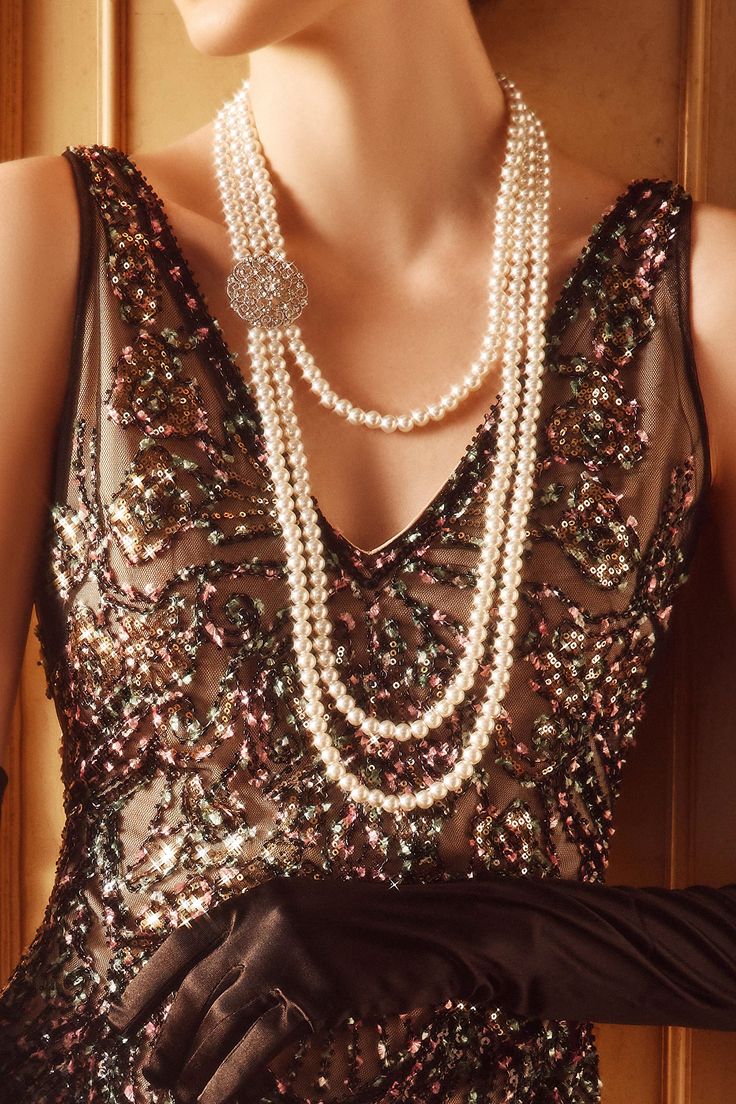 This sumptuous piece of jewelry features a retro-elegant yet slightly modern style that complements the lavish garments, reminiscent of the roaring 1920s. Features: Lustrous imitation pearls Necklace and earrings set Multi layer design 8mm pearls 1920s Famous Women, 1920s Pearls Aesthetic, 20s Accessories Jewelry, 20s Jewelry Accessories, 1920s Women Accessories, 20s Pearl Necklace, 1920s Fashion Jewelry, 1920s Pearl Necklace, 1920 Jewelry Necklaces