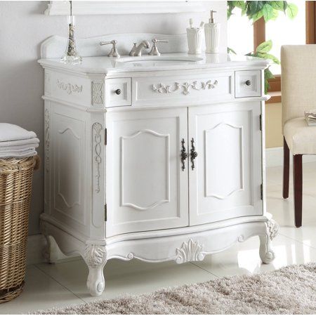 a white bathroom vanity with a sink and mirror on it's side, isolated against a white background