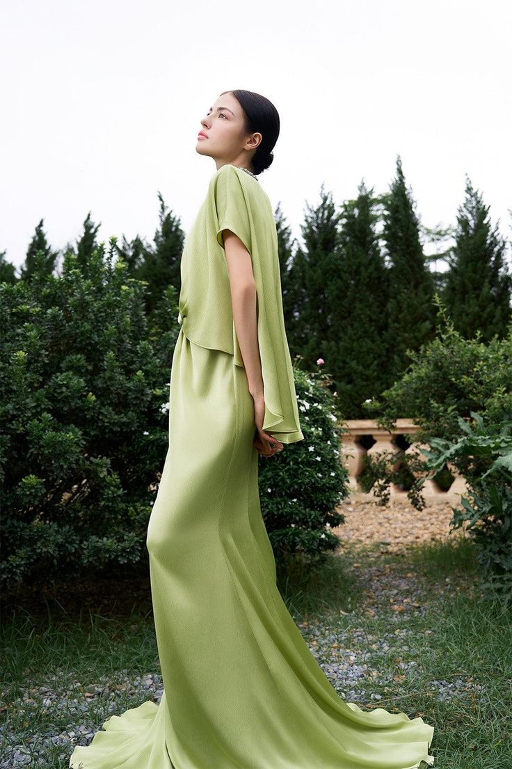 Elegant Asymmetrical Wedding Dress For Spring, Spring Pre-draped Fitted Silk Dress, Chic Asymmetrical Dress For Wedding Guest, Elegant Sleeveless Asymmetrical Dress For Wedding Guest, Green Draped Silk Maxi Dress, Green Draped Silk Evening Dress, Elegant Silk Asymmetrical Dress For Summer, Pre-draped Evening Dress With Asymmetrical Hem, Elegant Silk Asymmetrical Summer Dress