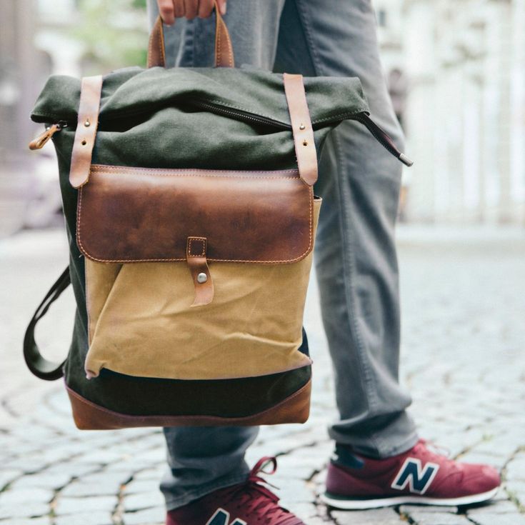 Are you in search of a fashionable and practical backpack for men? The Woosir Rolltop Canvas Backpacks is the perfect choice! This backpack has a drawstring design, one front pocket, and a back zip pocket for added convenience. Perfect for the modern man on the go!  The waxed canvas backpack is the perfect weekend holdall, designed to accommodate your gadgetry and weekend essentials.  This Rolltop Canvas Backpack is the perfect choice for everyday use. It's made from high-quality cotton canvas, Urban Outdoor Bags With Zipper Closure, Casual Leather Backpack With Anti-theft Pocket For Travel, Urban Green Backpack For Travel, Casual Leather Backpack With Adjustable Strap For Outdoor, Outdoor Canvas Backpack With Functional Pockets, Canvas Backpack With Zipper For Outdoor Activities, Outdoor Backpack With Zipper Closure, Casual Leather Backpack With Anti-theft Pocket For School, Casual Large Capacity Leather Backpack For Outdoor