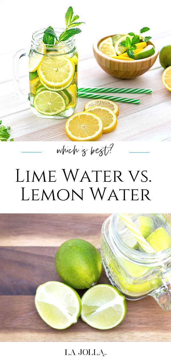 lemon water and limes on a wooden table