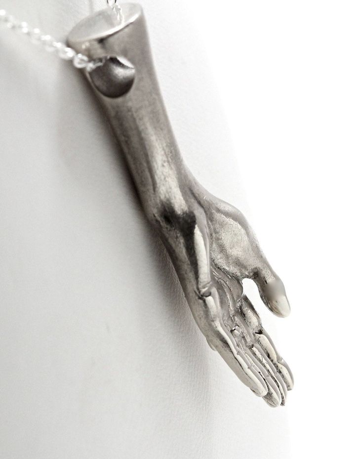 This elegantly detailed hand was designed , carved , cast and finished here in NYC. The hand is 1 3/4 inches long. It is cast in solid sterling silver and comes on your choice of silver chain lengths. This piece can be worn with the palm facing out to denote openness or palm down for protection. It may also be worn as a mourning piece palm down. You might notice the ring on the hand. I can set a little ruby,emerald, amethyst or what have you in that for $30. A diamond for $45. Just send me a con Victorian Hand, Hand Necklace, Necklace White, Hand Made Jewelry, The Palm, Stone Settings, Chain Lengths, Sterling Silver Chains, Silver Chain