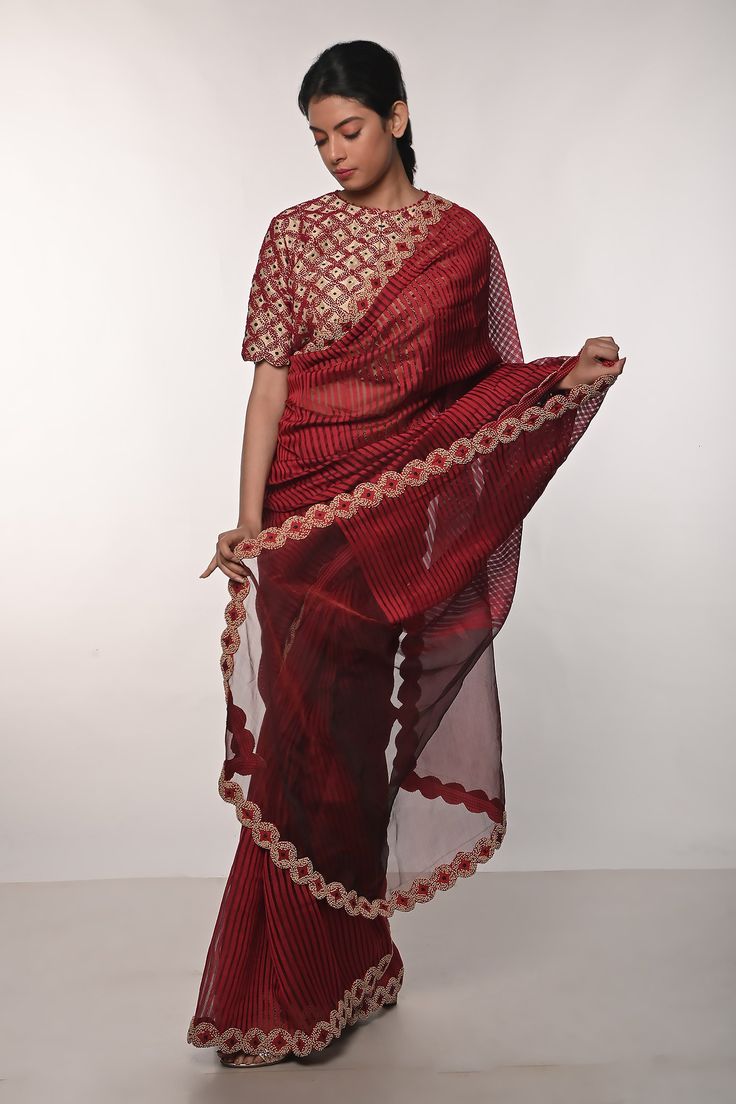 Red handloom silk saree with striped print and french knots hand embroidered borders. Comes with blouse and a belt.
Components: 3
Pattern: Printed, Hand embroidered
Type Of Work: Striped, French knots
Neckline: Round
Sleeve Type: Half
Fabric: Handloom silk
Color: Red
Other Details: 
Heavily embroidered blouse
Occasion: Sangeet - Aza Fashions Handloom Silk Saree, Round Border, Fashion Dictionary, Embroidered Saree, French Knots, Blouse For Women, Fashion App, Saree With Blouse, Blouse Online