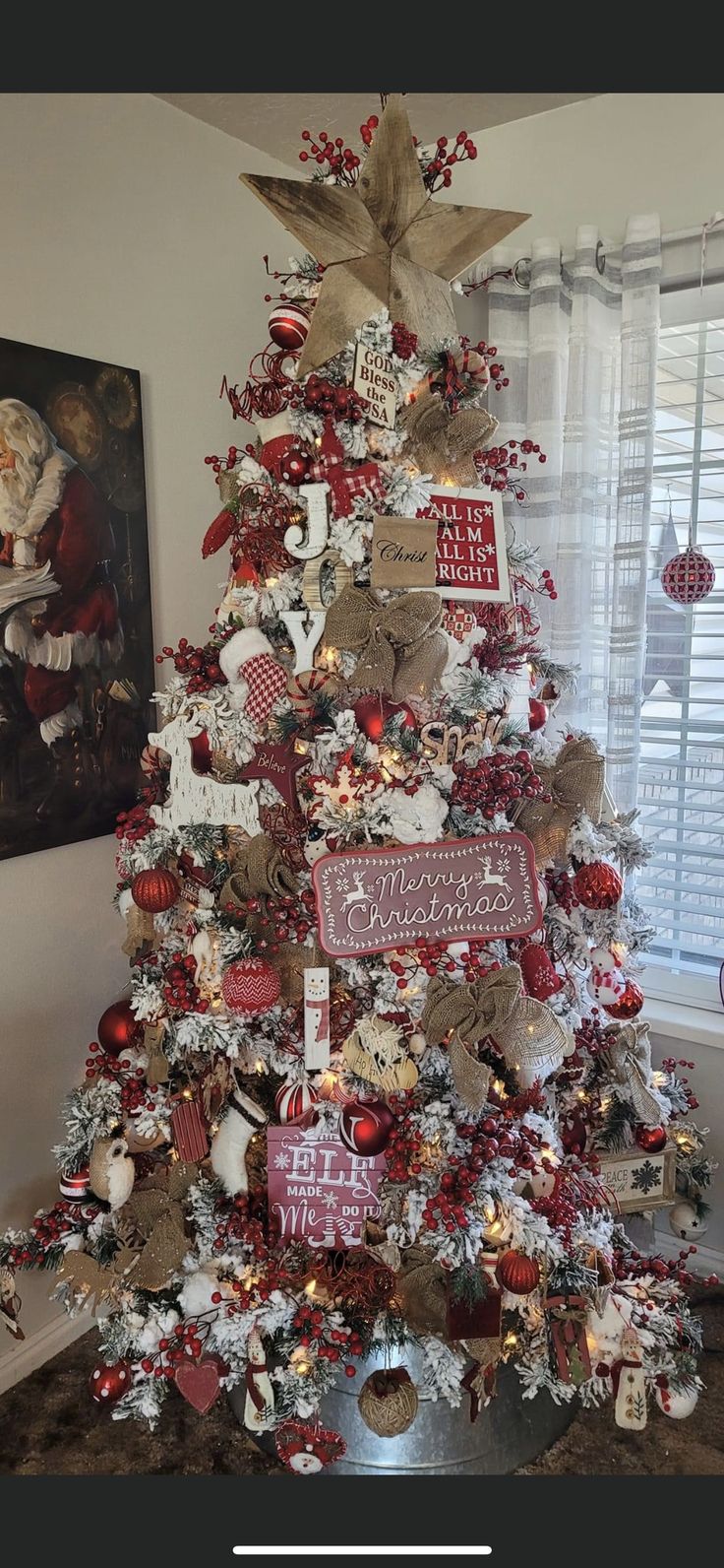 a christmas tree decorated with red and white ornaments