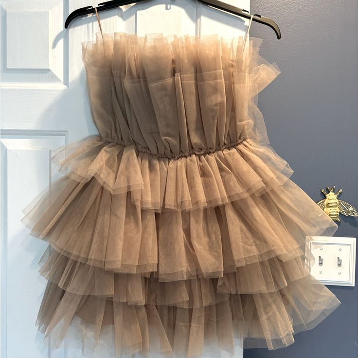 Mabl Size Small, Champagne Colored Tulle “Cupcake” Dress. Never Worn. Tags Still On. Satin Lined. Fits True To Size. Very Short. Sweet Party Dress With Ruffle Hem, Sweet Ruffle Dress For Brunch, Sweet Ruffled Dress For Brunch, Cute Tiered Mini Dress For Party, Sweet Ruffled Dresses For Parties, Cute Tiered Skirt Dress For Party, Sweet Sleeveless Ruffled Tutu Dress, Sweet Sleeveless Tutu Dress With Ruffles, Summer Ruffled Mini Tutu Dress