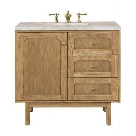 an image of a bathroom vanity with two sinks and wood cabinetry on the side