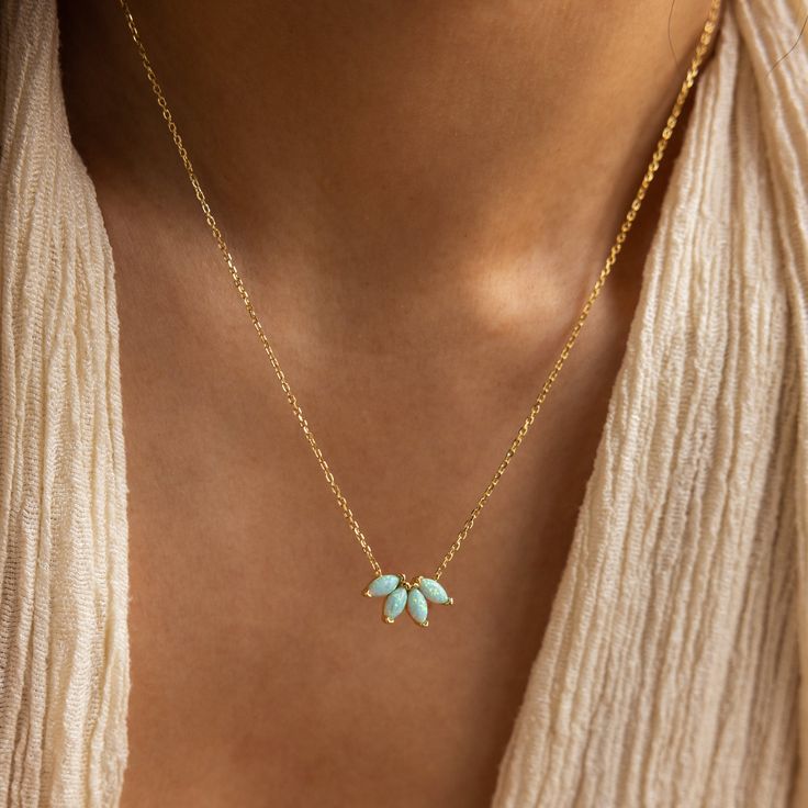 T U R Q U O I S E ∙ O P A L ∙ N E C K L A C E  Searching for a fresh, new look for the season? Our Turquoise Opal Marquise Necklace is the unique jewelry piece you are looking for! The floral design and enchanting turquoise gemstones make this pendant necklace a no brainer when it comes to a style refresh. * Material: High Quality Solid 925 Sterling Silver * Finish: 18K Gold ∙ Sterling Silver * Featuring ~15x8mm Marquise CZ Turquoise Opal Flower Pendant on a dainty Cable Chain, adjustable from 1 Turquoise Necklace Outfit, Gold And Turquoise Jewelry, Turquoise Jewelry Gold, Marquise Necklace, Rectangle Necklace, Necklace Opal, Small Necklace, Jewelry Birthday, Flower Pendant Necklace