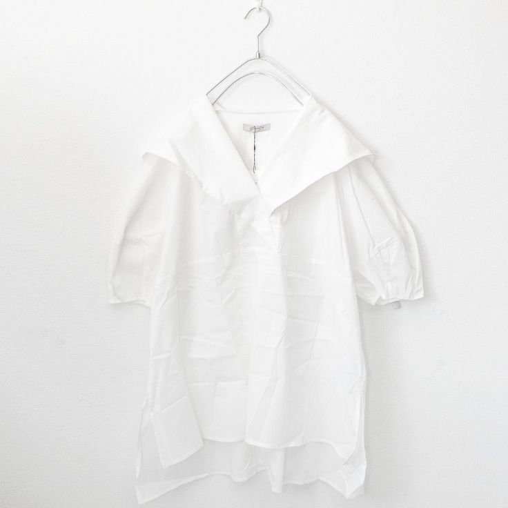 Big collar back flap short sleeve shirt. Ship from Japan Imported Limited stock (One Size)length 75cm/81cmwidth 65cm 60% cotton 34% nylon 6% polyurethane Summer T-shirt With Placket And Short Sleeves, Summer Half Sleeve Shirt With Placket, Summer Half-sleeve Shirt With Placket, Relaxed Fit Short Sleeve T-shirt For Daywear, Summer Top With Collar And Placket, Relaxed Fit Short Sleeve Top For Summer, Summer Short Sleeve Shirt With Collar And Placket, Casual Short Sleeve Blouse With Cuffed Sleeves, Spring Workwear Puff Sleeve Top