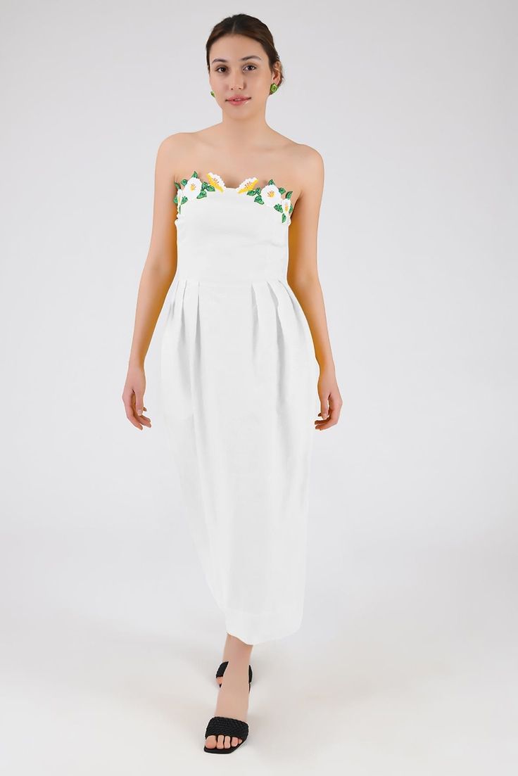 Strapless Linen Lorr Dress flaunts a sheath silhouette embellished with embroidered floral appliques along the neckline. Formal Floral Applique Midi Dress, Spring Embroidered Maxi Evening Dress, Chic Evening Maxi Dress With Floral Embroidery, Chic Floral Embroidery Maxi Dress For Evening, Sleeveless Floral Applique Midi Dress For Evening, Evening Maxi Dress With Embroidered Neckline, Spring Floral Embroidered Maxi Evening Dress, Gala Maxi Dress With Floral Applique, Formal Sleeveless Midi Dress With Floral Embroidery